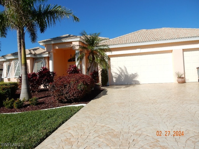 view of front of home with a garage