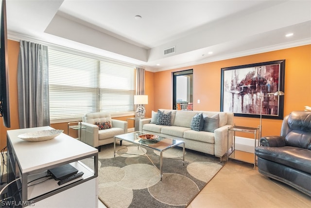 tiled living room featuring ornamental molding