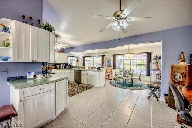 kitchen with white cabinets, pendant lighting, dishwasher, and light tile floors