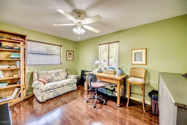 office area with ceiling fan and hardwood / wood-style flooring