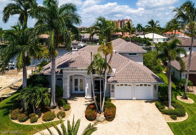 mediterranean / spanish-style house featuring a garage