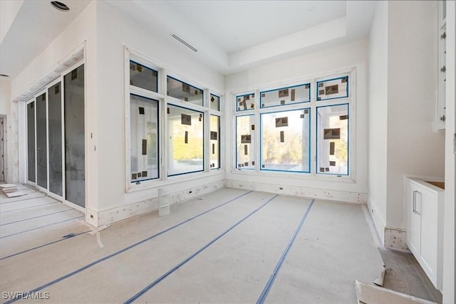 interior space featuring a tray ceiling