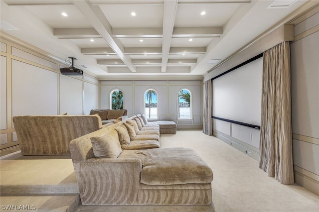 cinema with light colored carpet, beamed ceiling, coffered ceiling, and french doors