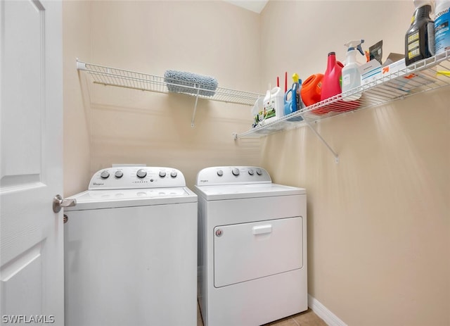 laundry area featuring washer and clothes dryer