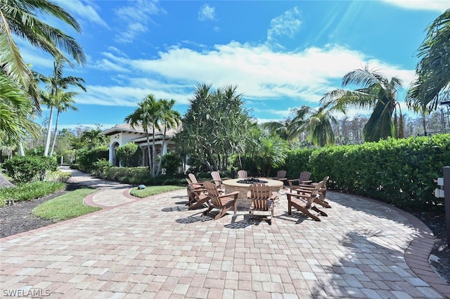 view of terrace featuring a fire pit