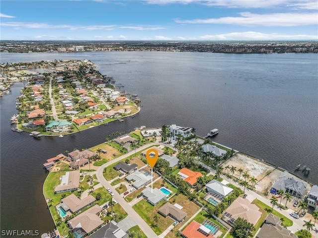 bird's eye view with a water view