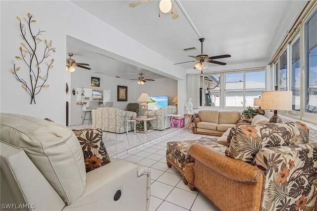 living room with light tile patterned floors