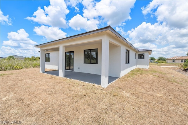 rear view of house with a patio area