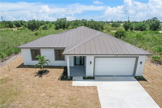 view of front of home featuring a garage