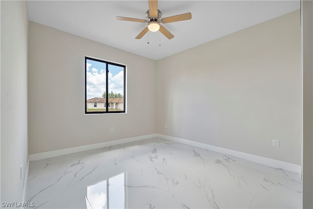 spare room featuring ceiling fan