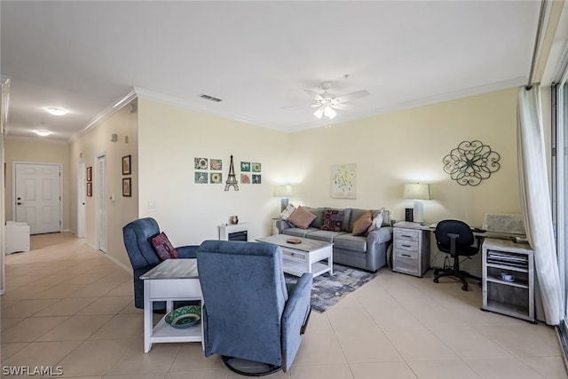 tiled living room featuring ceiling fan and ornamental molding