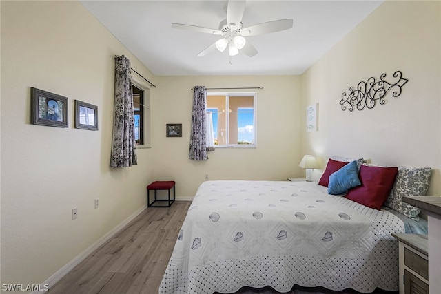 bedroom featuring ceiling fan and wood-type flooring