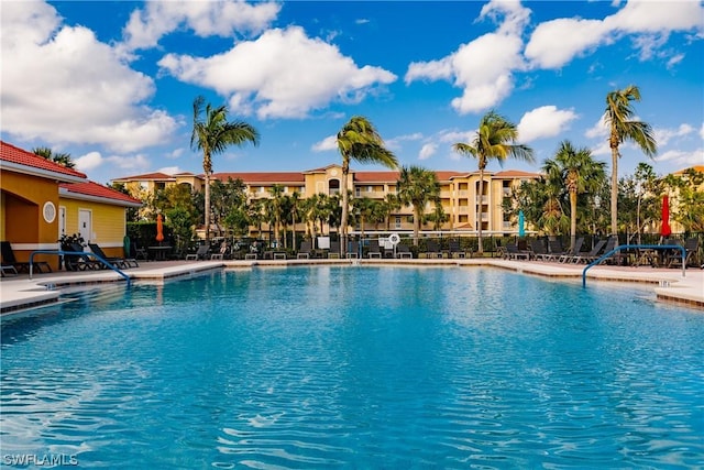 view of swimming pool featuring a patio area