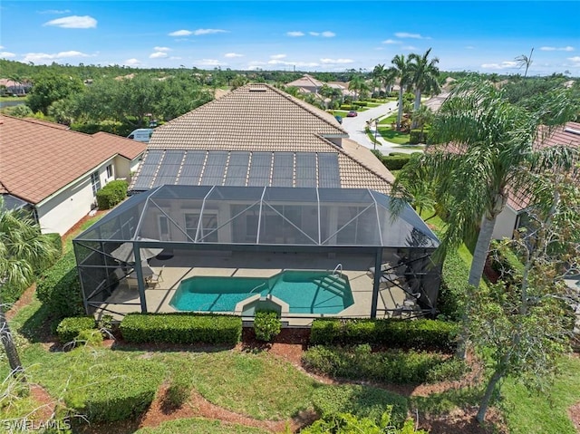 view of pool with a lanai and a patio area