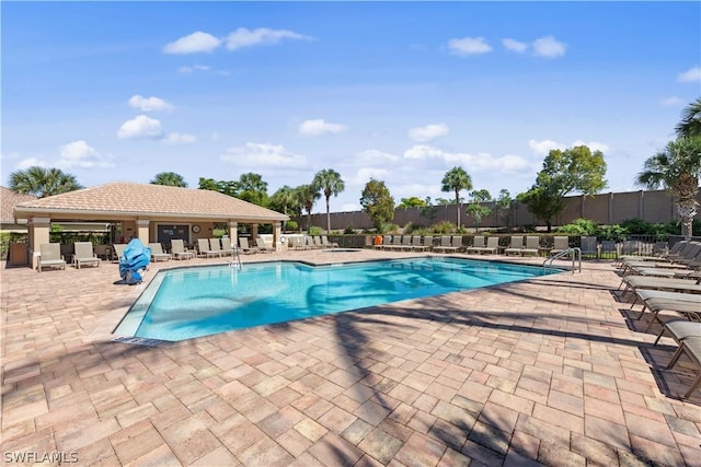 view of pool featuring a patio