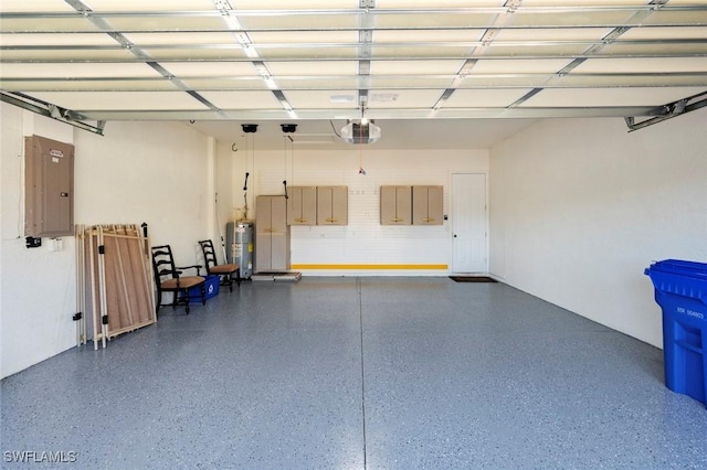 garage featuring a garage door opener, electric water heater, and electric panel