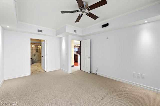 unfurnished bedroom featuring ceiling fan, light carpet, and crown molding