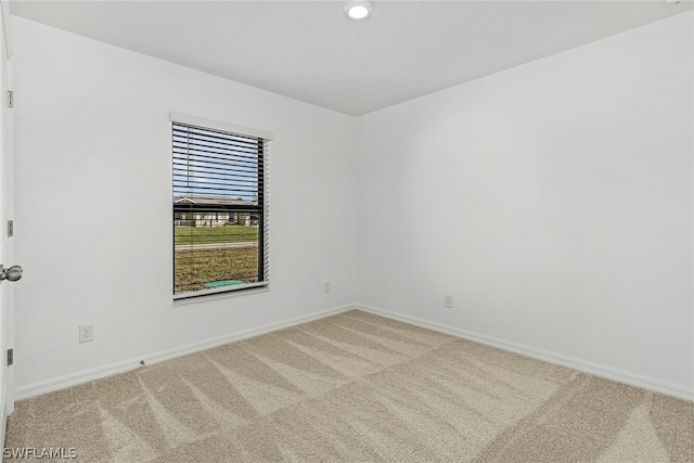 view of carpeted spare room