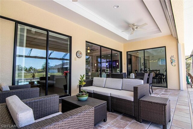 view of patio featuring an outdoor living space and ceiling fan