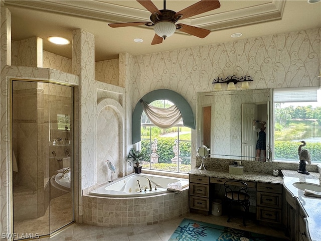 bathroom with oversized vanity, ceiling fan, a tray ceiling, plus walk in shower, and tile floors