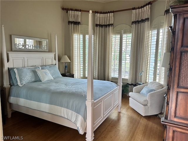 bedroom with wood-type flooring