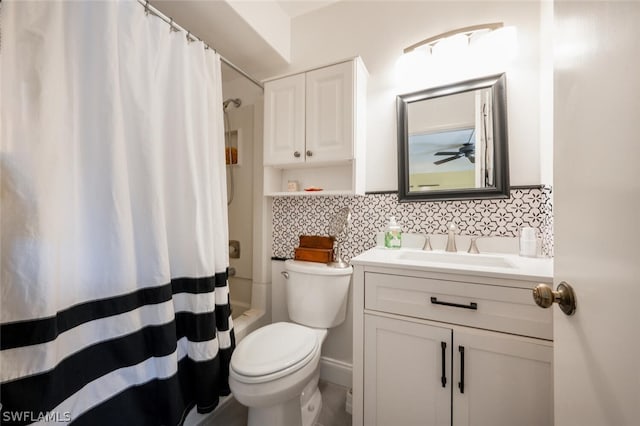 full bathroom with tile walls, vanity, shower / bathtub combination with curtain, tasteful backsplash, and toilet