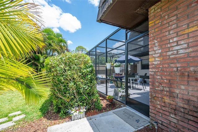 doorway to property with a patio