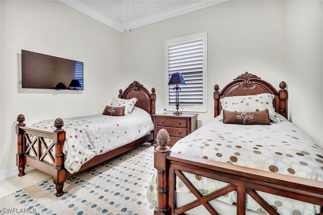 bedroom with crown molding