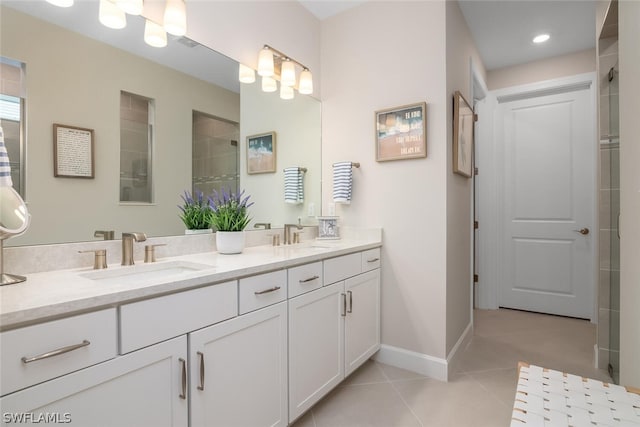 bathroom with tile flooring and dual vanity