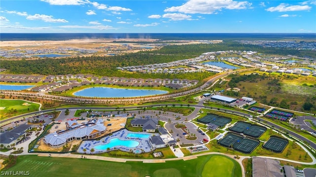 bird's eye view with a water view