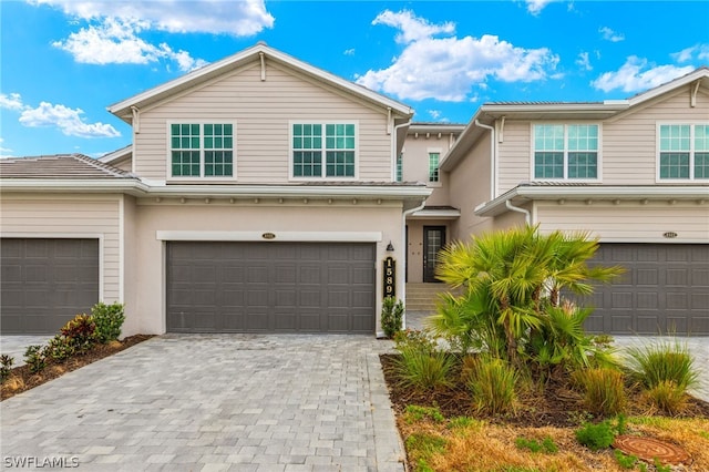 view of front of property with a garage