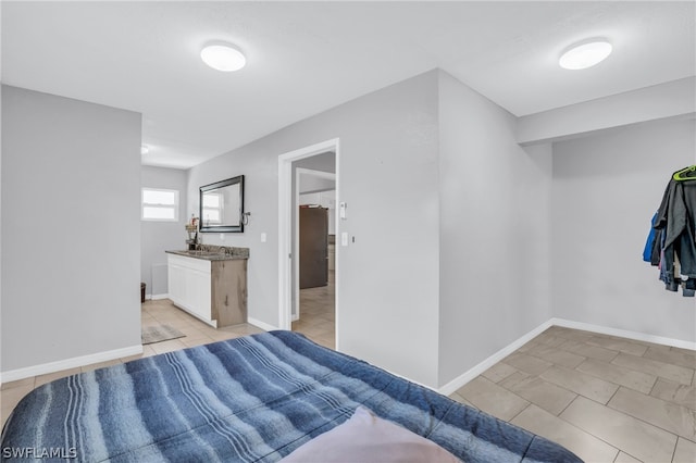 bedroom with light tile floors