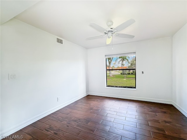 empty room featuring wood-type flooring and ceiling fan