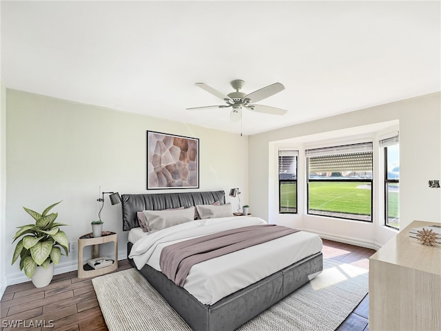 bedroom featuring wood-type flooring and ceiling fan