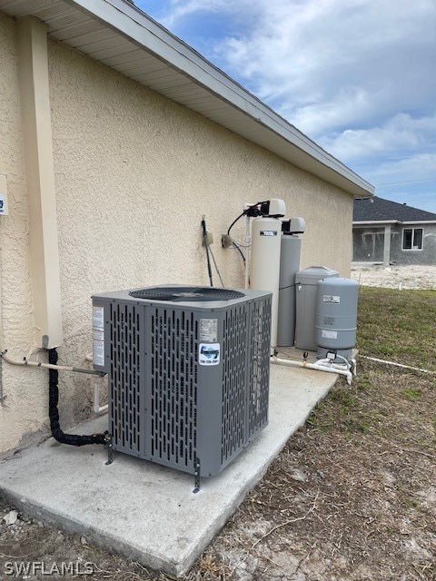 exterior details featuring central AC unit