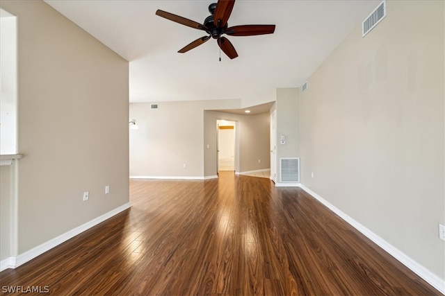 spare room with ceiling fan and wood-type flooring