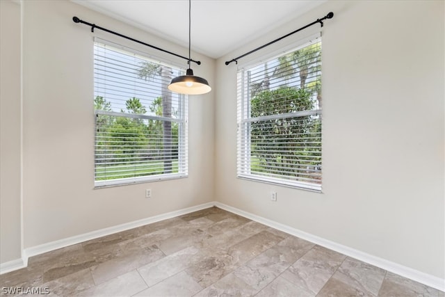 view of tiled spare room