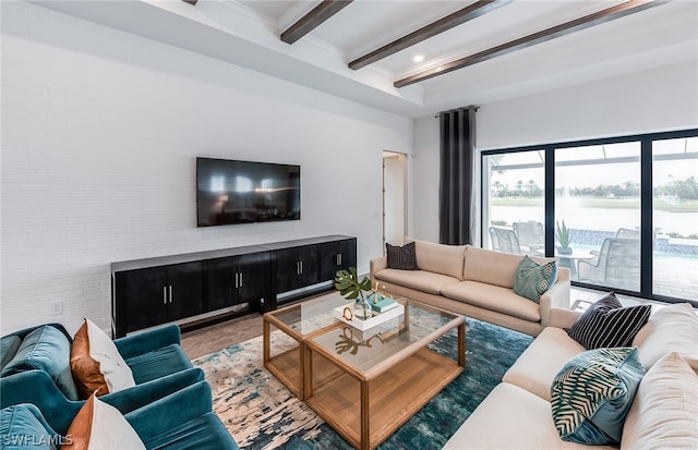 living room featuring beamed ceiling and a water view