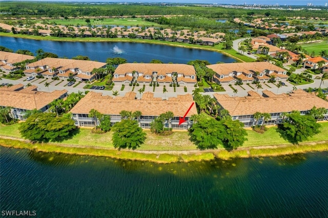 drone / aerial view with a water view