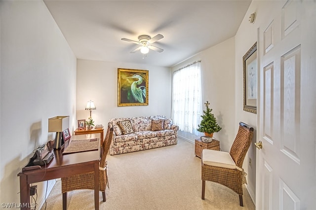 office featuring carpet floors and ceiling fan