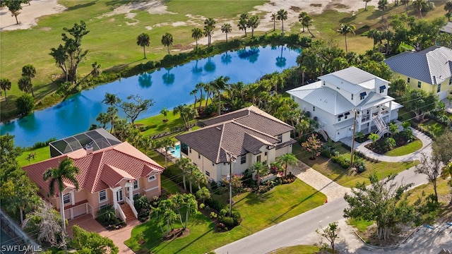 drone / aerial view featuring a water view