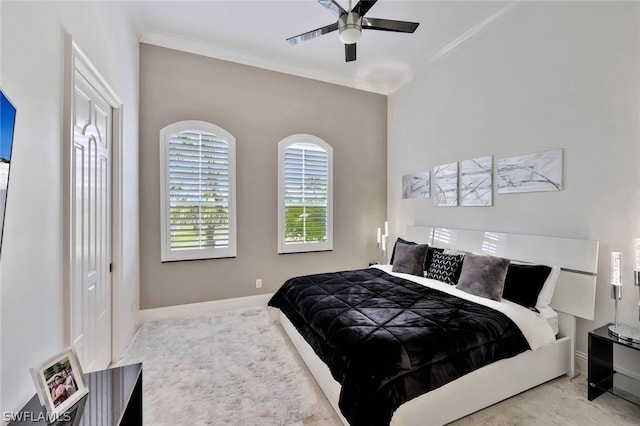 bedroom with crown molding and ceiling fan