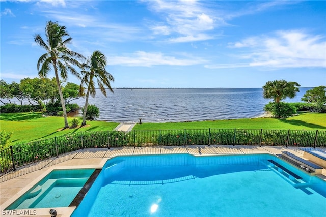 view of pool featuring a water view and a yard