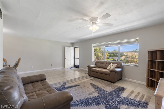 living room with ceiling fan and light tile floors