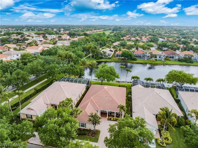 drone / aerial view with a water view