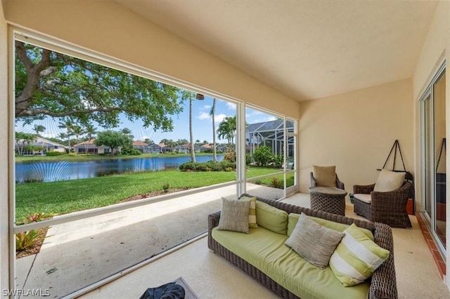 sunroom with a water view