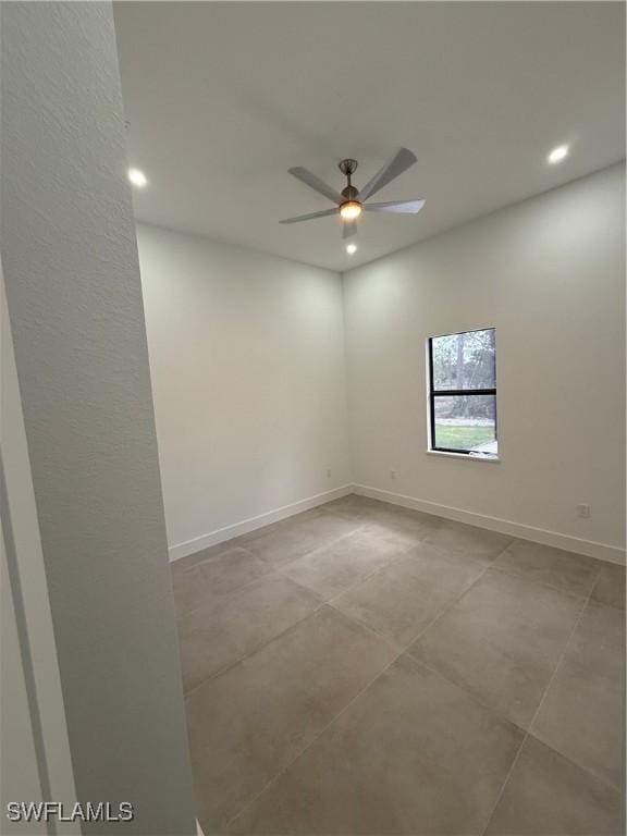 unfurnished room with ceiling fan