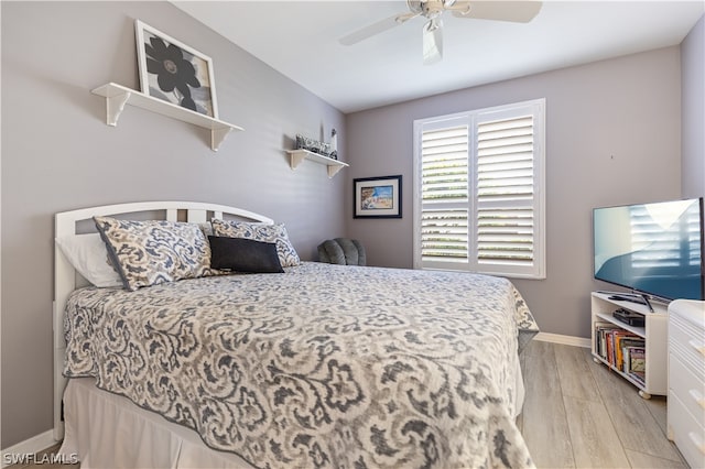 bedroom featuring ceiling fan and light wood-type flooring