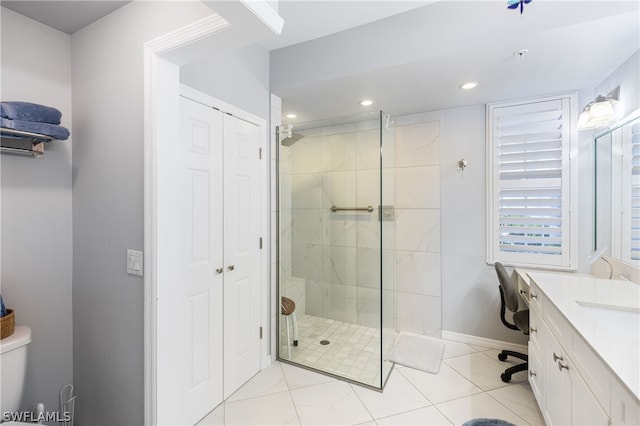 bathroom featuring an enclosed shower, tile flooring, vanity, and toilet