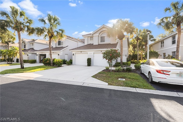 view of front of property with a garage